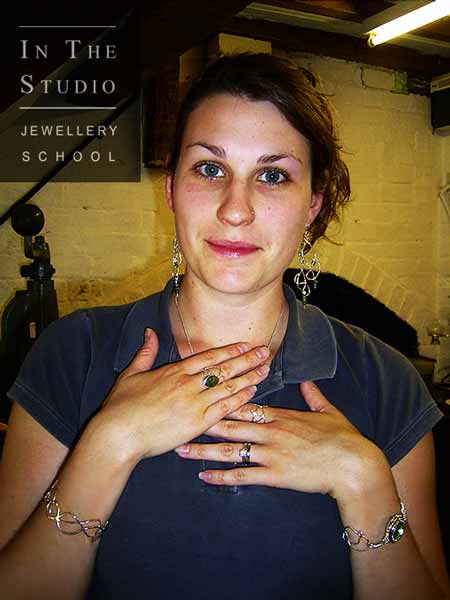 A female student modelling her silver jewellery set