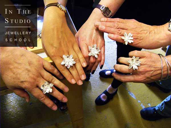 Argentium Silver floral rings on hands