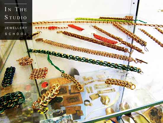 Chain-maille-pieces-in-cabinet