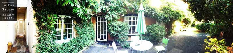 Courtyard-and-whisteria-in-mid-summer