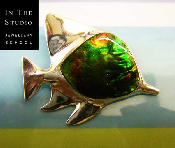 Cast-Silver-Fish-Pendant-with-Stone-Setting