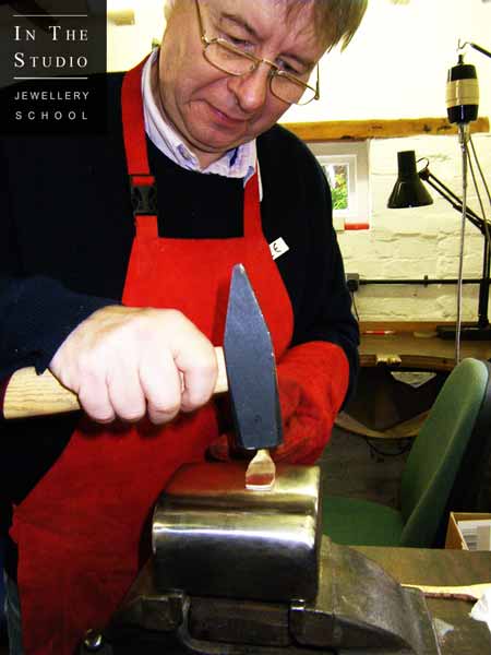 Forging a spoon from silver